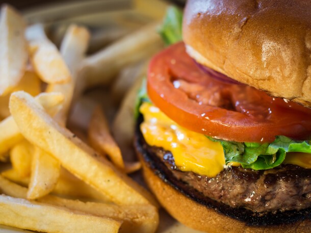 Cheeseburger and fries up close