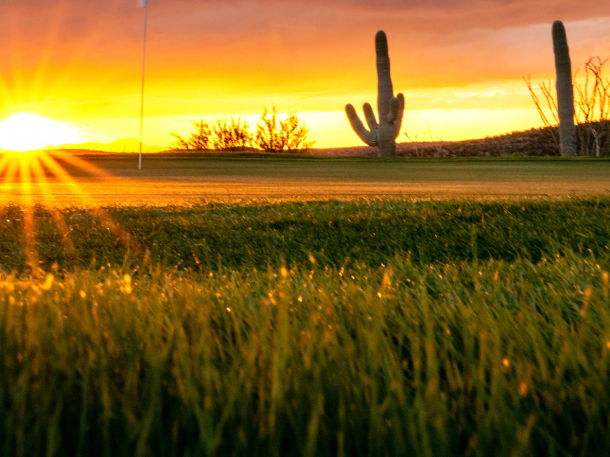 Arizona National Golf course sun strike through clouds